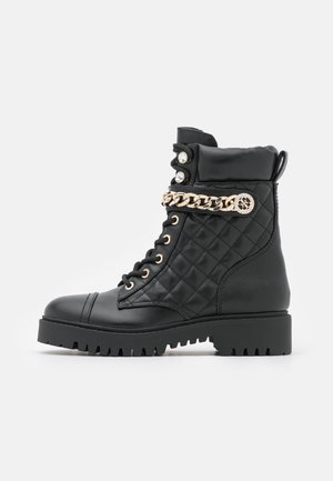 Stivaletti con plateau - black