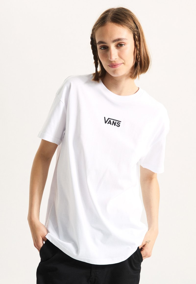 White cotton t-shirt with short sleeves, round neck, and embroidered "VANS" logo on the chest. Smooth texture and relaxed fit.