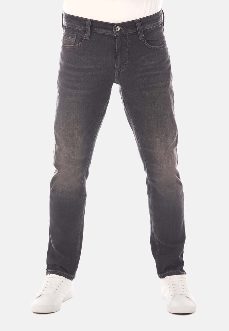 Jeans de mezclilla gris con corte ajustado, parte delantera desgastada y diseño clásico de cinco bolsillos. Presentan un cierre de botón y detalles cosidos.