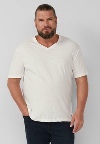 Witte, gestructureerde V-hals T-shirt met korte mouwen, relaxed fit, met een lichte glans en een kleine logo-accent aan de zoom.