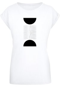 Hvid t-shirt med korte ærmer, der har et centralt sort grafisk design med to sorte halvcirkler og bølgede linjer imellem. Blød bomuldsstruktur.