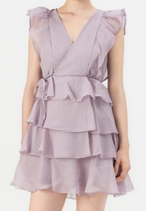 Lavender ruffled dress with a V-neck, sheer fabric, and layered tiers. Features short flutter sleeves and a waist tie for adjustment.