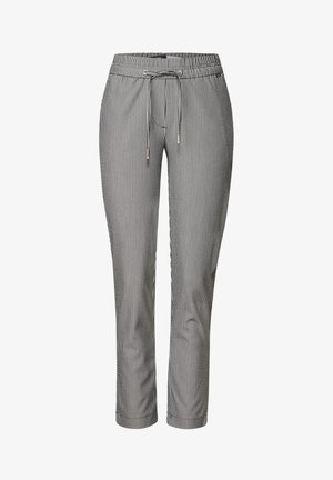 Pantaloni a righe realizzati in tessuto leggero, con vita elastica, chiusura con cordino e gambe affusolate. Schema di colori bianco e nero.