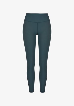 Magas derekú leggings bordázott türkiz szövetből. Slim fit szabású, varrás nélküli kialakítással és sima textúrával az egész anyagon.