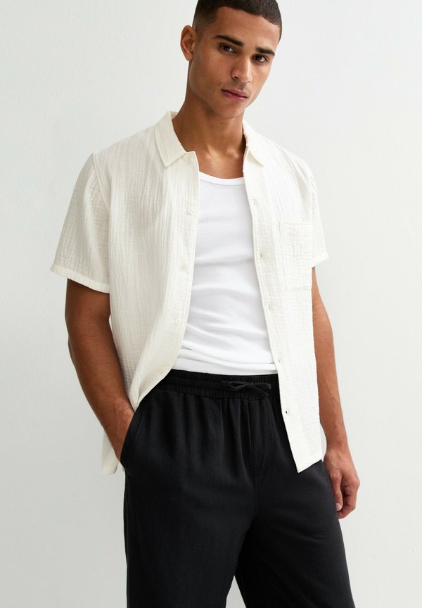 RELAXED SHORT SLEEVE TEXTURED - Hemd