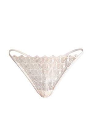 Kanten string met een bloemig hartpatroon, lichtbeige kleur, witte elastische afwerking en een transparante textuur. Heeft een driehoekige vorm.