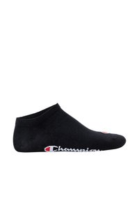 Black ankle socks made of cotton blend, featuring a ribbed cuff, white "Champion" logo on the side, and a small red accent.