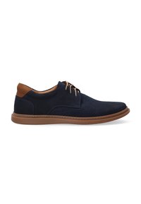 Navy blue perforated leather shoes with a tan heel and brown rubber sole. Features lace-up design and contrast stitching accents.