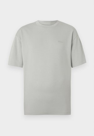 Light gray short-sleeve crew neck T-shirt with subtle embroidered logo on the left chest, flat lay on white background.