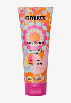 Amika Soulfood voedende haarmasker tube met kleurrijke bloem- en geometrische ontwerpen, oranje achtergrond, roze dop, formaat 100 ml.