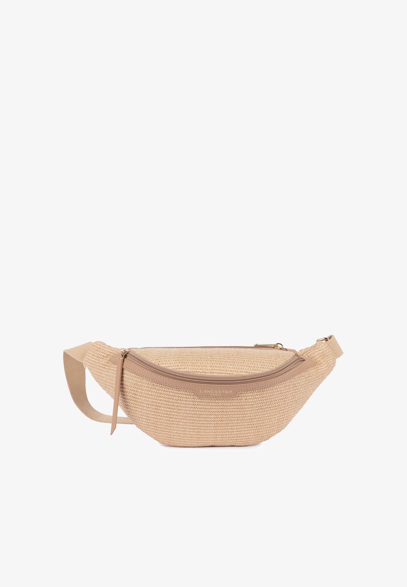 Sac bandoulière en tissu beige avec poche avant zippée et sangle en tissu réglable, marqué "Lancaster Paris" sur le panneau avant.