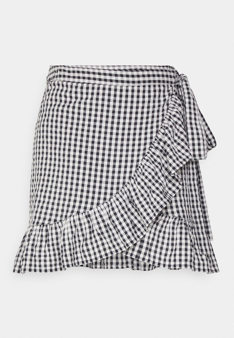 Falda envolvente a cuadros en blanco y negro con dobladillo con volantes y detalle de lazo lateral. Tela ligera, con un patrón de cuadros.