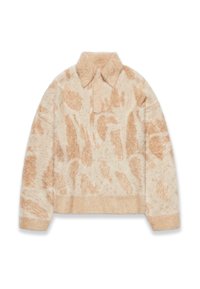 Pullover in pelliccia beige con colletto, caratterizzato da un motivo astratto e texturizzato in beige chiaro. Design cropped con una finitura morbida.