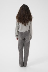 Gray sweatshirt and loose-fitting gray jeans, showing rear view. Jeans feature back pockets and a slightly textured fabric.
