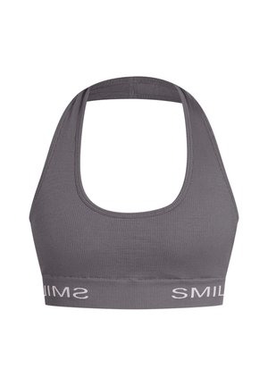 Soutien-gorge de sport gris à côtes avec un décolleté arrondi et de larges bretelles. Présente un bandeau élastique avec le texte "SMILE" en blanc.