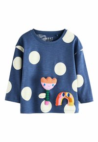 Blauses Langarmhemd mit großen weißen Punkten. Verfügt über ein texturiertes Blumen- und Regenbogenapplikation in lebendigen Farben. Lässiges Design.