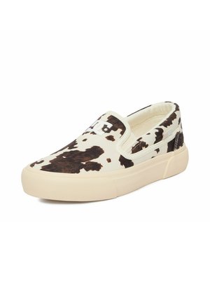 Slip-on sneaker med beige sål og sort-hvidt ko-mønstret print og hvidt logo på øverste front.