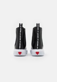 Love Moschino Botki na platformie