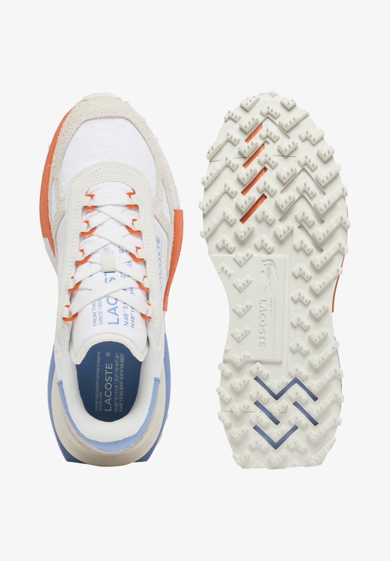 White, beige, and light blue Lacoste sneaker with orange accents shown from top and sole views, featuring a textured tread pattern.
