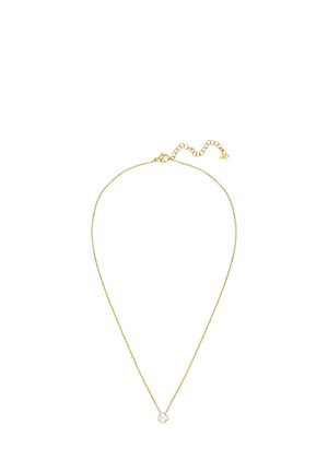 Collier délicat en chaîne d'or avec un petit pendentif trèfle à quatre feuilles blanc et une extension de fermoir ajustable.