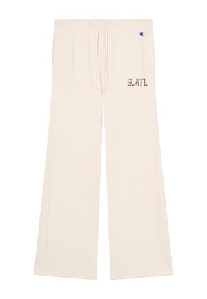 Cremewitte sweatpants met wijde pijpen, trekkoord in de taille, zijzakken, "S.ATL" print op de rechterdij, en klein Champion-logo vlak bij de taille.