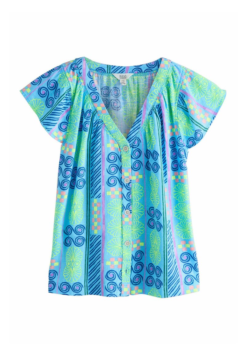 Chemise à manches courtes en tissu bleu à motif vibrant de tourbillons, de feuilles et de rayures dans des tons de vert et de rose.