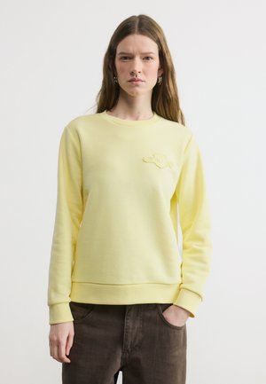 TONAL SHIELD C NECK - Športni pulover - vanilla yellow