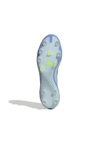 Football cleat sole in translucent white with blue accents, featuring six plastic studs and textured grip patterns. Adidas logo visible.