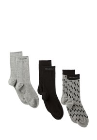 Set of three pairs of socks: two in light grey, one in black with geometric pattern, all featuring logo at the cuff. Soft, stretchy material.