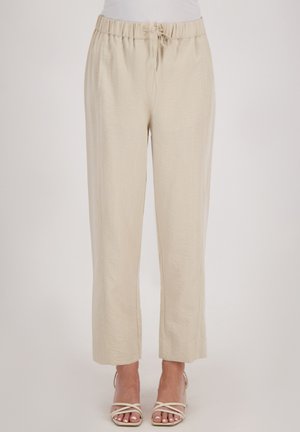 Beige, loszittende, lichtgewicht broek met een elastische tailleband en verstelbaar trekkoord; heeft rechte pijpen en een gestructureerde stof.