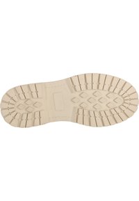 Semelle de botte en caoutchouc crème avec des motifs de texture, comprenant des formes diamants et rectangulaires pour une adhérence et une durabilité accrues.