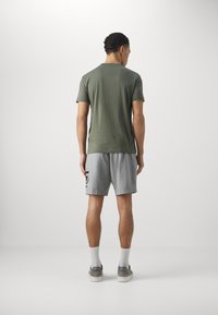 EA7 Emporio Armani Pantaloni sportivi - fumo di londra