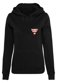Sudadera negra con un bolsillo frontal. Presenta "SOPA DE RAMEN" en letras rojas en negrita sobre un gráfico de un tazón. Confeccionada en una tela suave y texturizada.