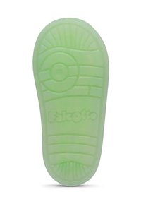 Soletta traslucida di colore verde chiaro con texture rigate, motivi circolari e l'impronta "Falcotto" vicino al centro.