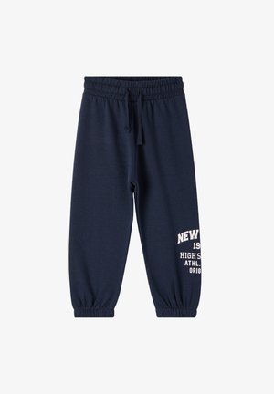 Pantaloni sportivi blu navy con vita elasticizzata, cordino e polsini elasticizzati, con stampa di testo bianco sulla gamba sinistra.