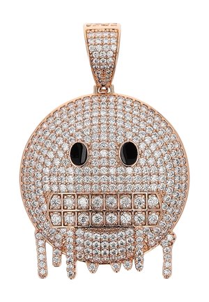 Rond gouden hangertje bezet met heldere stenen, zwarte ovale ogen, geklemde tanden en een druppelend effect aan de onderkant.