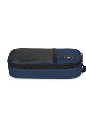 Blue fabric pencil case with a black mesh top panel, zippered closure, rectangular shape, and branded tag on the side.