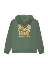 Sudadera verde con capucha y un gran diseño geométrico en oro y negro en la parte posterior, que presenta el texto "EL EQUILIBRIO DE LOS OPUESTOS". Material de algodón.