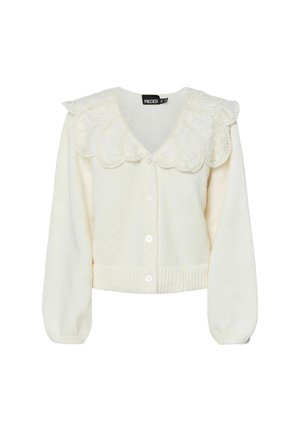 Cardigan en tricot blanc avec un col à volants, fermeture à boutons et ourlet côtelé. Texture douce et manches longues bouffantes.