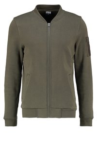 Olive green bomber jacket in cotton blend with front zipper, two side pockets, and a zippered sleeve pocket. Ribbed cuffs and hem.