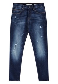 Vaqueros de mezclilla azul oscuro con un corte slim, que presentan detalles desgastados en los muslos y las rodillas, cinco bolsillos y un cierre clásico de botones.