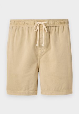 Beige afslappede shorts med elastisk linning og hvid snor, lavet af letvægtsstof, velegnet til varmt vejr.