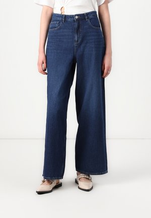 ONLPAULINA BAGGY WIDE - Leveälahkeiset - dark blue denim