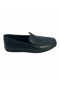 Scarpa slip-on in pelle nera con finitura liscia, punta arrotondata e dettagli di cucitura minimale lungo il bordo. Suola in gomma a profilo basso.