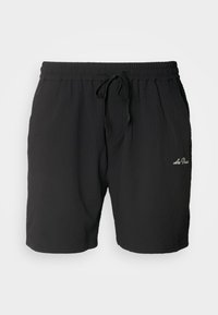 Shorts texturés noirs avec ceinture élastique et cordon noir, poches latérales et petit logo blanc "Les Deux" sur la jambe gauche.