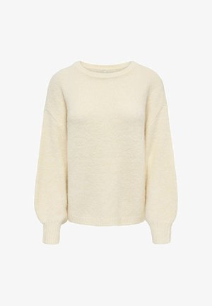 Pull tricoté couleur crème avec manches longues bouffantes et col rond sur fond blanc.