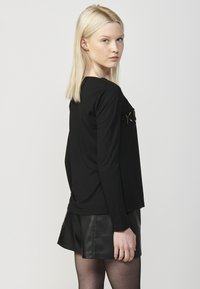 Koroshi Hosszú ujjú felső - black