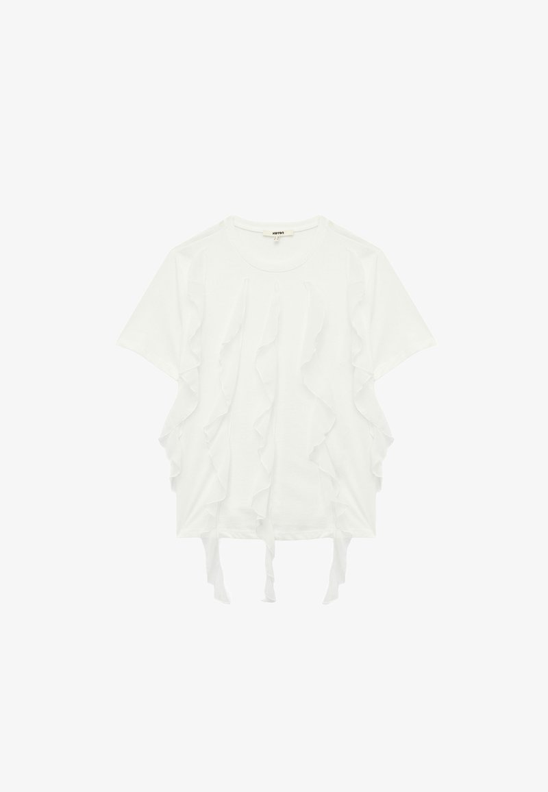 Weißes T-Shirt mit kurzen Ärmeln, das an den Vorderseiten mit geschichteten Rüschen verziert ist und Bindebänder am unteren Saum hat. Aus weichem Stoff, lockere Passform.
