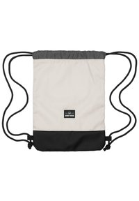 Zsinóros hátizsák bézs testtel, szürke tetejével és fekete aljával. Logó folttal és fekete zsinórokkal a záráshoz és hordáshoz.
