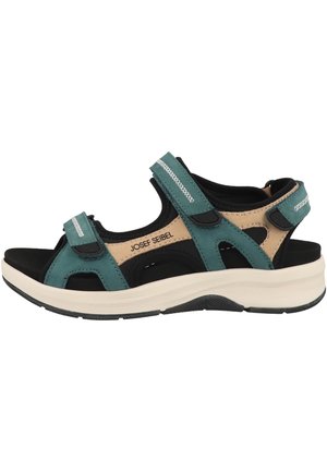 Sandalia deportiva abierta de punta en color azul verdoso y beige con suela negra, tres correas ajustables de Velcro y plantilla acolchada de Josef Seibel.